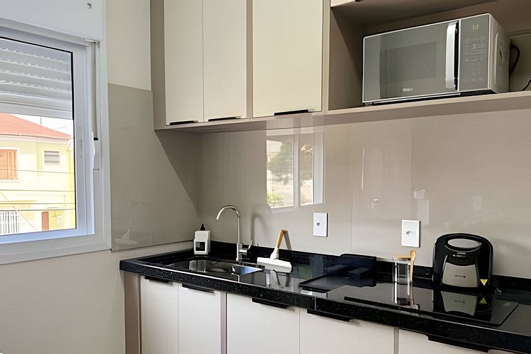 Flat 11 amplo c/ ar-condicionado perto Anclivepa